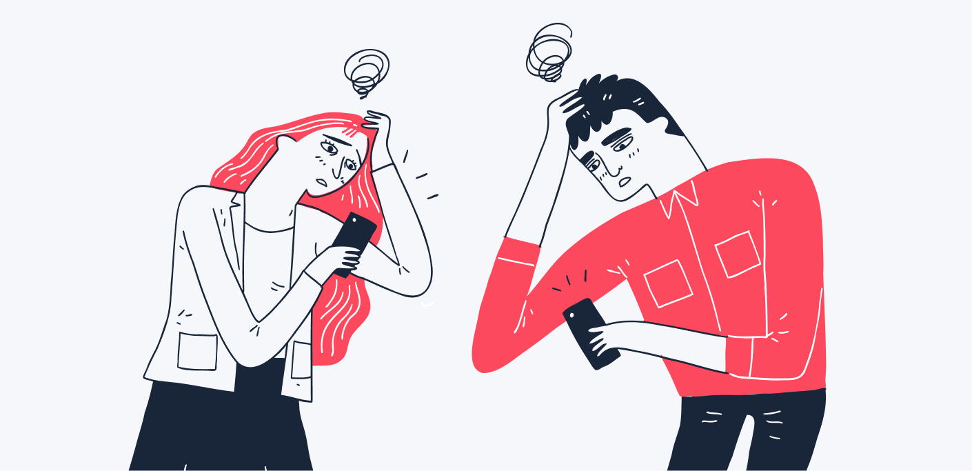 Concerned man and woman look at phone