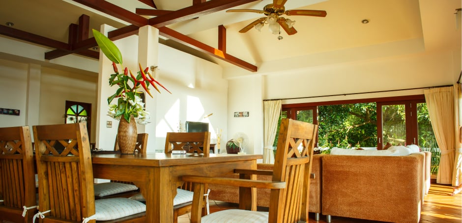 Dining room and lounge areas in an affordable home