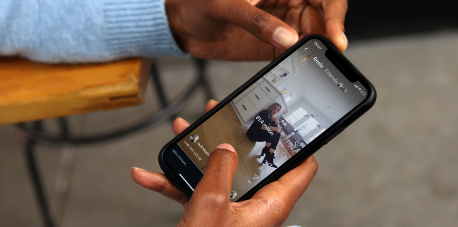 Person views a social media advert on their cellphone