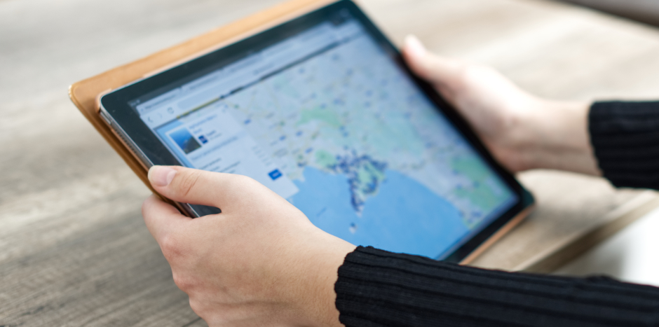 Person views a map on a tablet