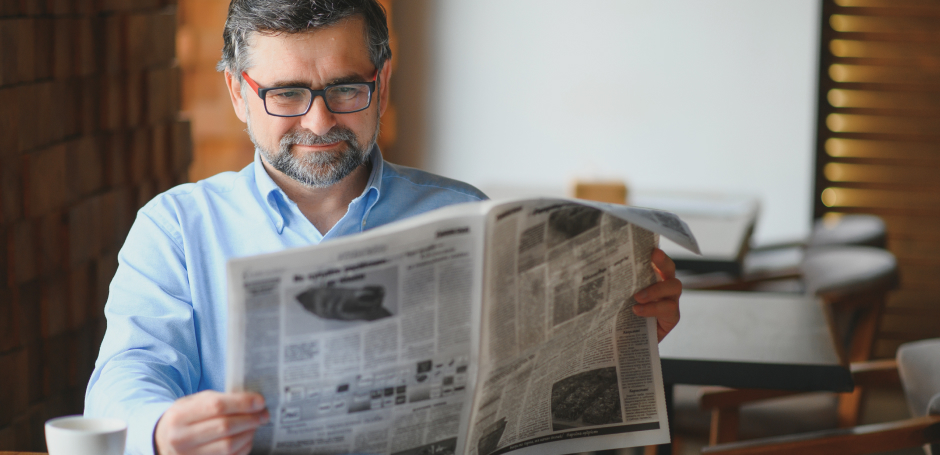 Man reads a newspaper