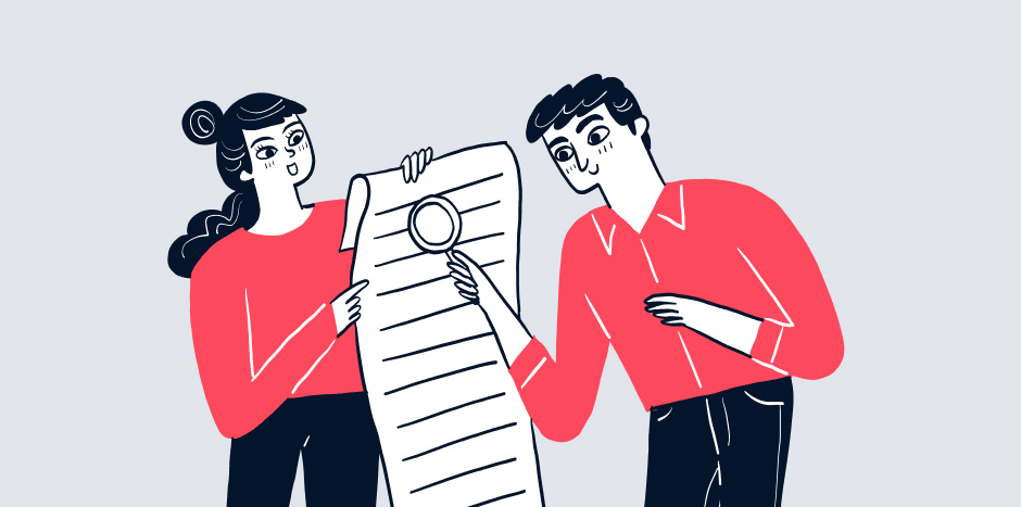 A man views a document with a magnifying glass