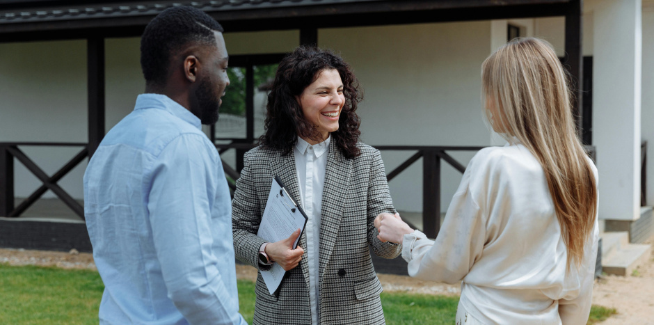 An estate agent canvasses a couple's home