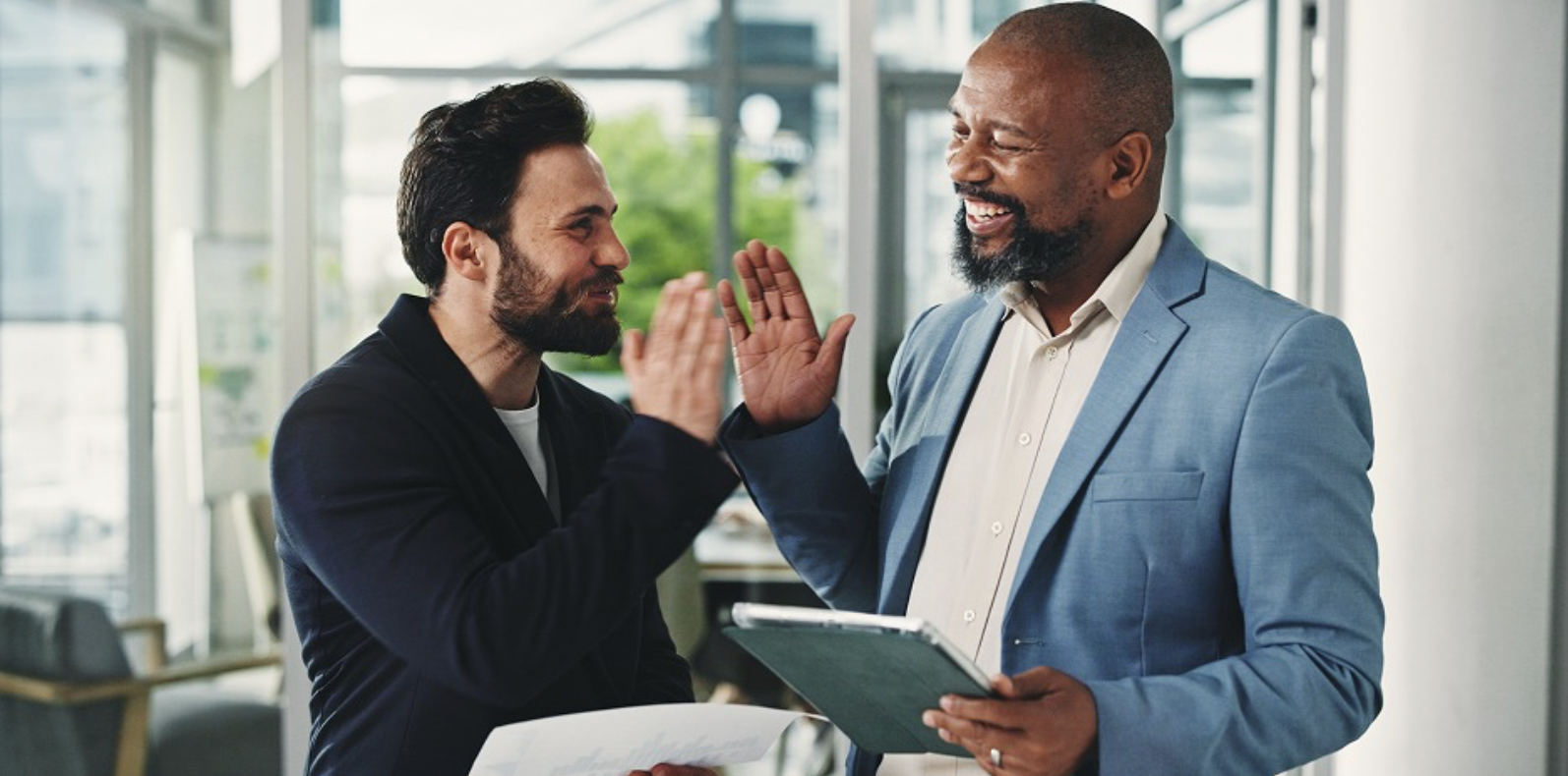 real estate agent high-fiving client