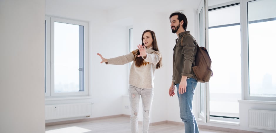 Man and woman view property and picture themselves living there