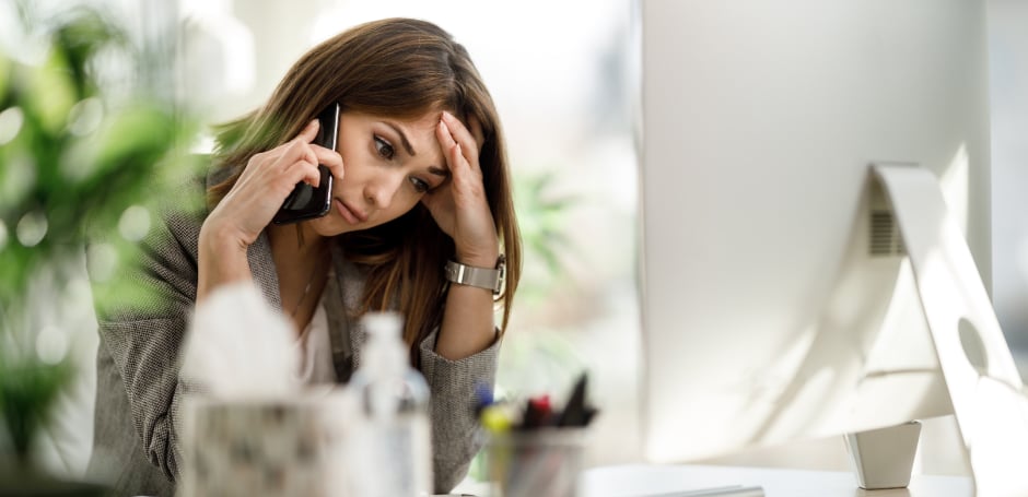 Worried woman on a phone call